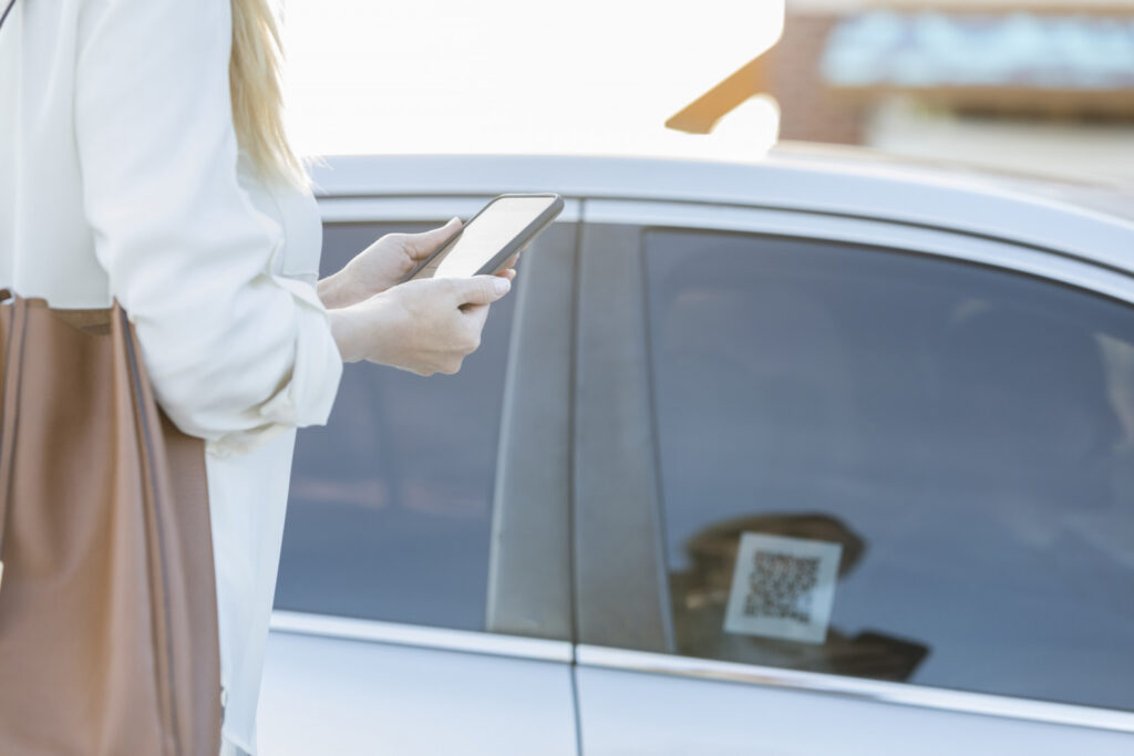 Person waiting for Uber or Lyft vehicle.