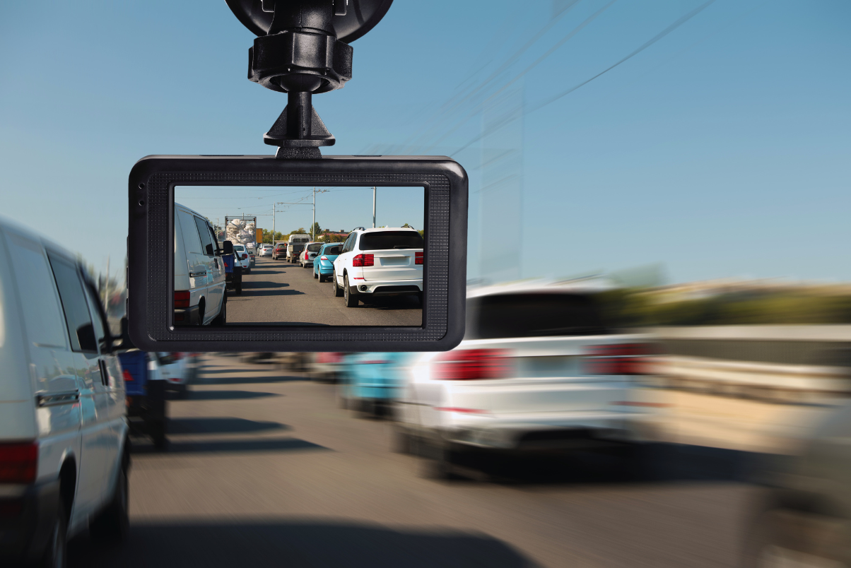 Driver's point of view with dash cam installed on dashboard